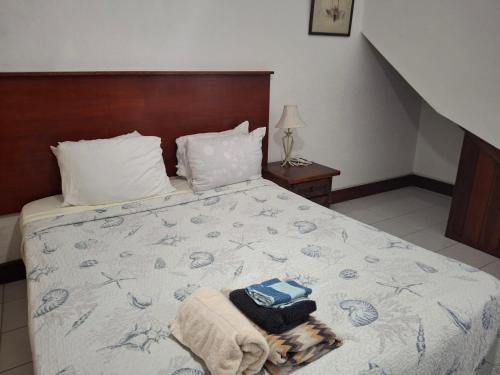 Postel nebo postele na pokoji v ubytování BLR Villas Dover Beach