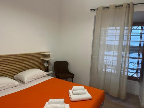 Postel nebo postele na pokoji v ubytování Ottaviano Lodge