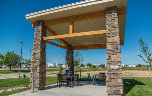 a pavilion with tables and chairs in a park at My Place Hotel-Boise/Meridian, ID in Meridian
