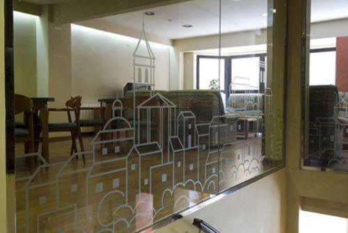 
a kitchen filled with lots of counter space at Hotel Avenida in Requena
