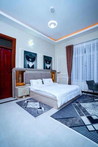 Postel nebo postele na pokoji v ubytování Lm Massive Homes