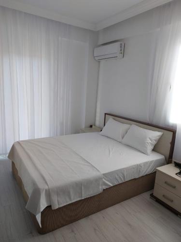 Postel nebo postele na pokoji v ubytování Villa Okaliptus 48