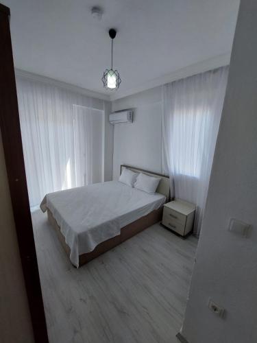 Postel nebo postele na pokoji v ubytování Villa Okaliptus 48
