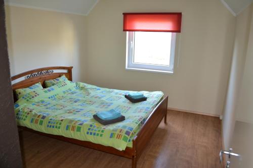 Кровать или кровати в номере Noorteka 3 Apartment