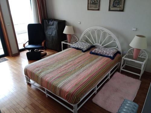Ένα ή περισσότερα κρεβάτια σε δωμάτιο στο Caminhada Guest Room