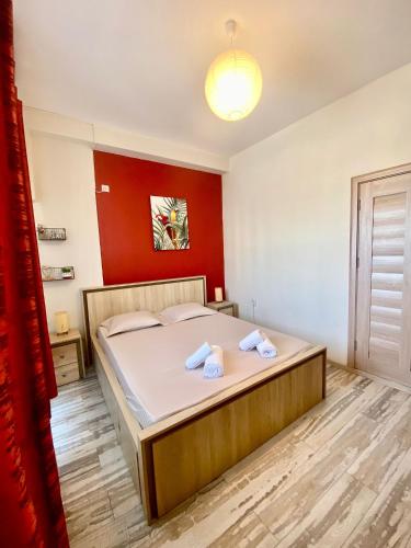 Кровать или кровати в номере Kira's Exclusive group 6-apt' 26 people' 8 rooms'