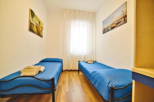 Postel nebo postele na pokoji v ubytování Casa Dalmazia
