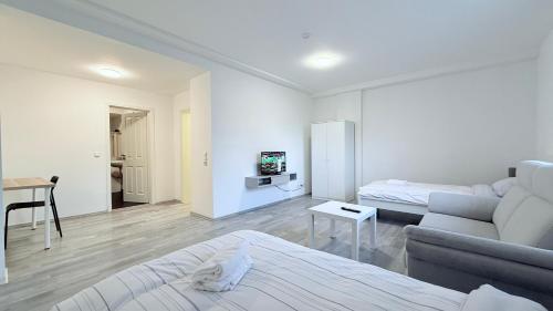 Μια τηλεόραση ή/και κέντρο ψυχαγωγίας στο ProStay Apartments - nahe Itzehoe