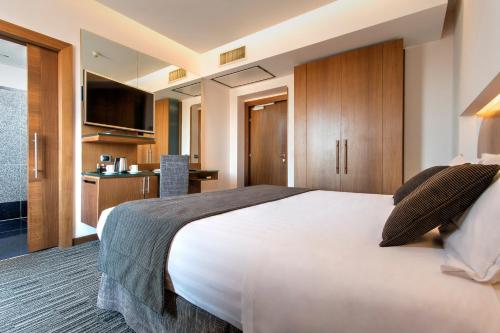 Postel nebo postele na pokoji v ubytování Best Western Plus Hotel Universo