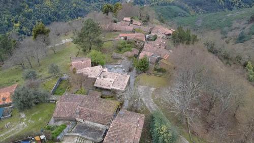 an aerial view of a house on a hill at Casal do Amor in Lousã