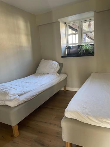 Postel nebo postele na pokoji v ubytování Baekgaarden 3 rooms Apartment - old farm house