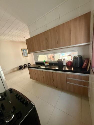Dapur atau dapur kecil di Aconchego no Litoral Sul