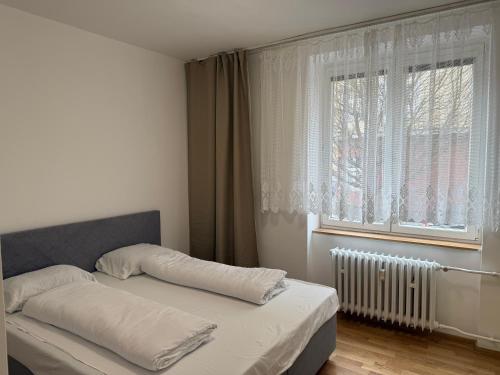 Giường trong phòng chung tại Apartment GALAXY 2