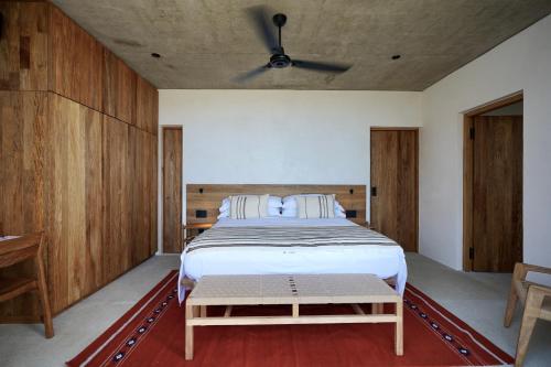 Postel nebo postele na pokoji v ubytování El Guayacan