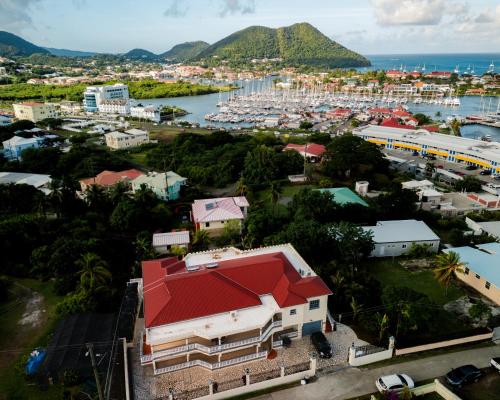 an aerial view of a city with a harbor at Sauna Pool Game Room Bliss in Rodney Bay Village