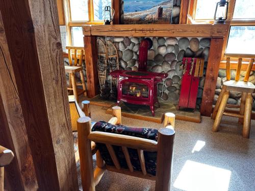 an overhead view of a room with a fireplace at Chewuch Inn & Cabins in Winthrop