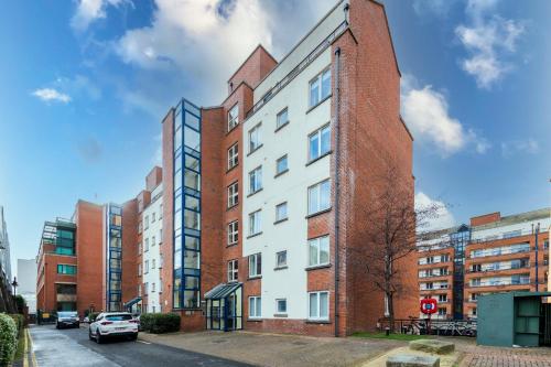 an apartment building with a red brick at CustomerHouse Dublin 1, Balcony View in Dublin