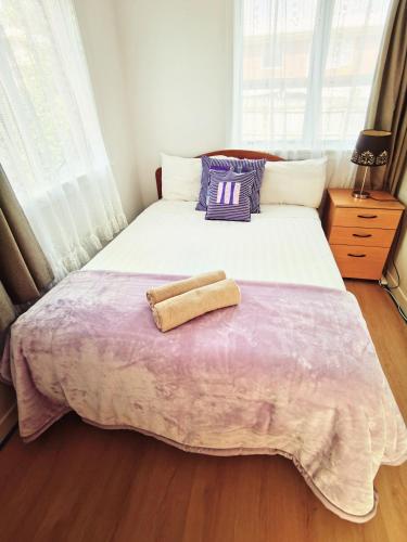 Кровать или кровати в номере Regent Residential House