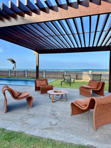 Πισίνα στο ή κοντά στο CASA ALTO PADRÃO BEIRA MAR AO LADO DO Zorah Beach Trairi - Flecheiras