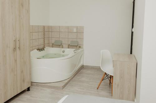 Koupelna v ubytování Hotel Plataneras Caney