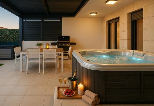 a jacuzzi tub in the middle of a living room at Luxury Apartment Mona with Garden & Jacuzzi in Zadar, Borik in Zadar