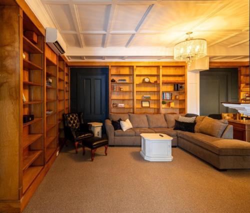 a living room with a couch and a table at 210 Main St in Ellsworth