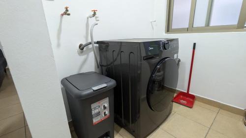 a water heater in a corner of a room at Vive Centro Histórico CDMX in Mexico City
