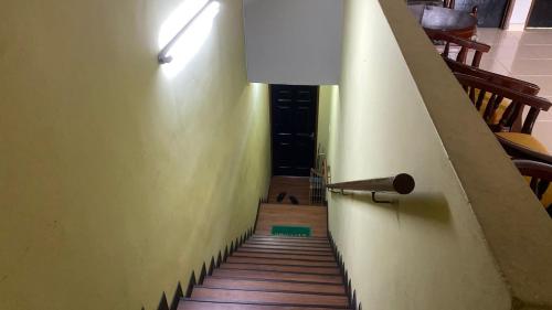 a view of a stairway with a hallway and a stair case at Jentayu homestay in Seri Iskandar