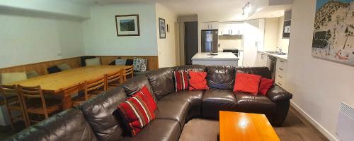 Un lugar para sentarse en Alpine View Apartments