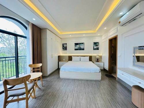 Ένα ή περισσότερα κρεβάτια σε δωμάτιο στο Chuỗi Villa 6 Phòng Ngủ Hạ Long - Harborbay HB25