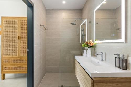 a bathroom with a sink and a shower at Villa Laura by See Residence -Near Cystal bay- Inclued Airport pick up in Amphoe Koh Samui