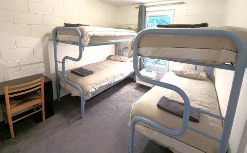Una cama o camas en una habitación de Alpine View Apartments