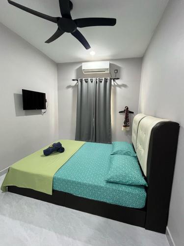 Postel nebo postele na pokoji v ubytování RAZAK GUEST HOUSE