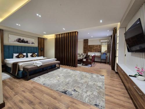 Телевизор и/или развлекательный центр в Ziyorat Luxury Hotel