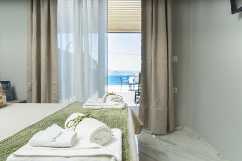 Katil atau katil-katil dalam bilik di Villa Orama - Sea view with private pool