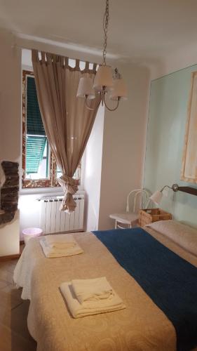 Letto o letti in una camera di La Gioia