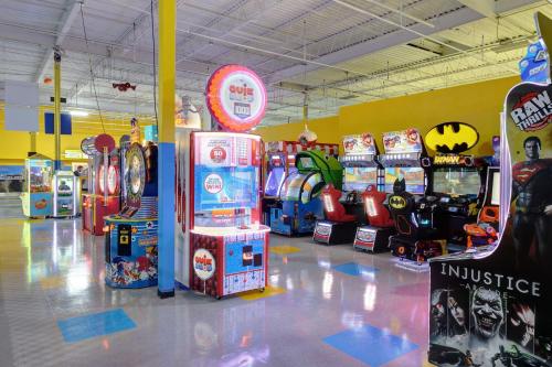 a room filled with lots of arcade games at Holiday Inn Express Philadelphia NE - Langhorne by IHG in Langhorne