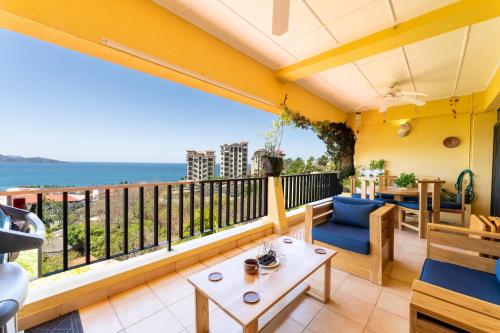 a balcony with a view of the ocean at Paraiso Presidential 20 -Ocean View Penthouse And Digital Nomad Haven in Playa Flamingo
