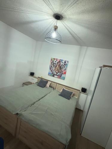 Katil atau katil-katil dalam bilik di Emsquartier Apartment No 2