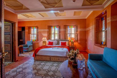 Postel nebo postele na pokoji v ubytování Atlas Castle Marrakech