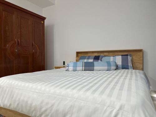Postel nebo postele na pokoji v ubytování Sophia Apartment S14-08