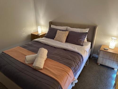 Ένα ή περισσότερα κρεβάτια σε δωμάτιο στο Riseonic Properties