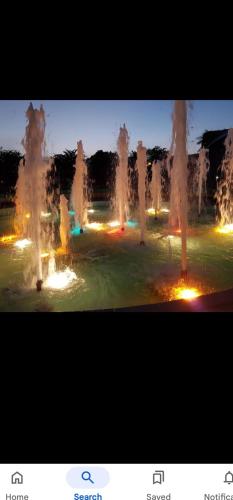 a group of water fountains in a park at Comfy and cozy in Kingston