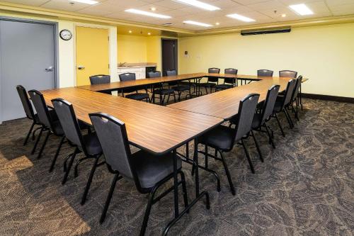 a large conference room with a long table and chairs at Comfort Inn & Suites in Moose Jaw