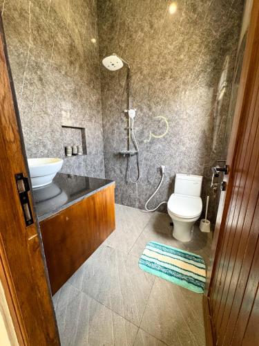 Ένα μπάνιο στο Homestay - Villa Domik