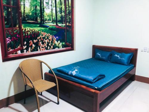 Postel nebo postele na pokoji v ubytování Khách sạn Sông Hiếu