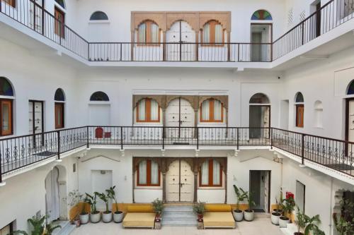 an internal view of a building with balconies at Dev Niwas - Heritage Hotel in Būndi