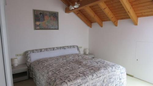 Ένα ή περισσότερα κρεβάτια σε δωμάτιο στο Panorama Seeblick