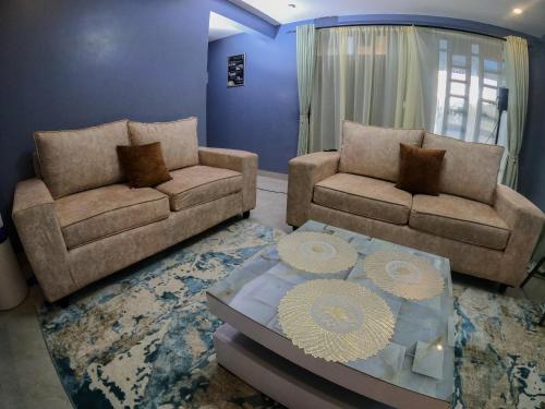 Ruang duduk di Cnc BnB-Kimana-1bedroom
