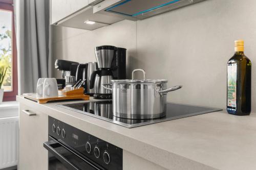 Η κουζίνα ή μικρή κουζίνα στο ElbDreams Cozy Design Apartment